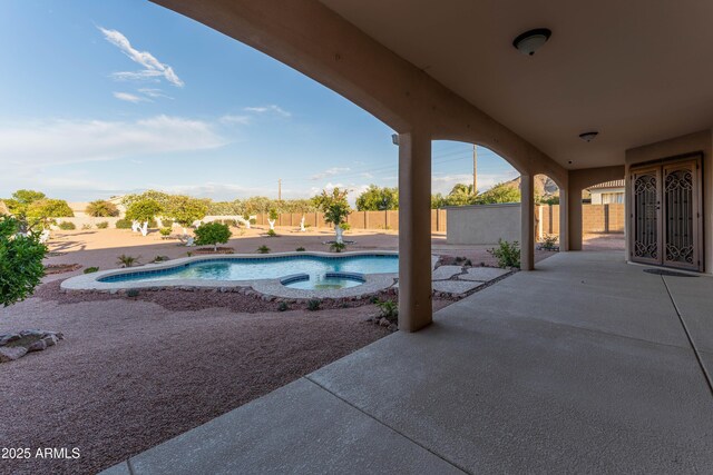7969 S 172nd St, Queen Creek, AZ 85142 - outdoor pool with a patio, an in-ground hot tub, and a fenced backyard