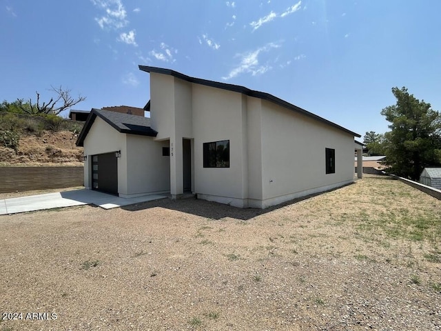 exterior space featuring a garage