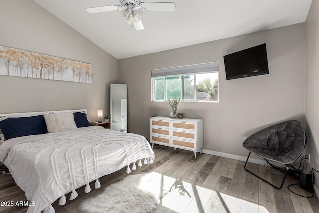 520 N Stapley Dr Unit 286, Mesa, AZ 85203 - bedroom featuring vaulted ceiling, a ceiling fan, baseboards, and wood-type flooring