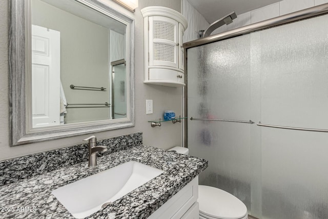 520 N Stapley Dr Unit 286, Mesa, AZ 85203 - bathroom with vanity, toilet, and a stall shower