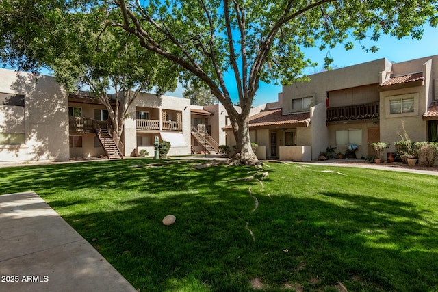 520 N Stapley Dr Unit 286, Mesa, AZ 85203 - view of building exterior with a residential view and stairs