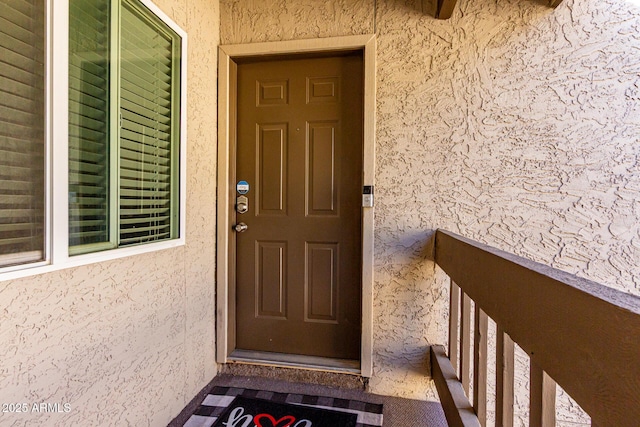 520 N Stapley Dr Unit 286, Mesa, AZ 85203 - doorway to property with stucco siding