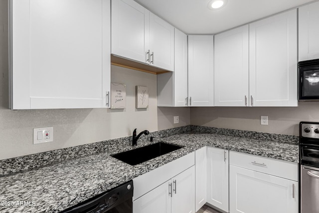 520 N Stapley Dr Unit 286, Mesa, AZ 85203 - kitchen with black appliances, a sink, stone countertops, recessed lighting, and white cabinets