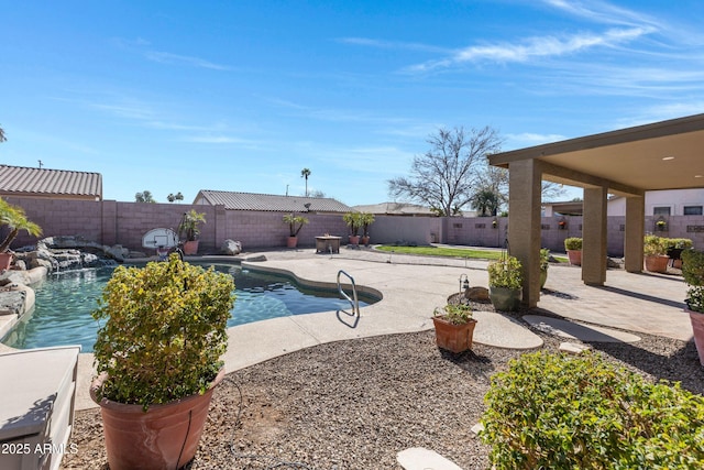 view of swimming pool with a fenced in pool, a patio area, and a fenced backyard