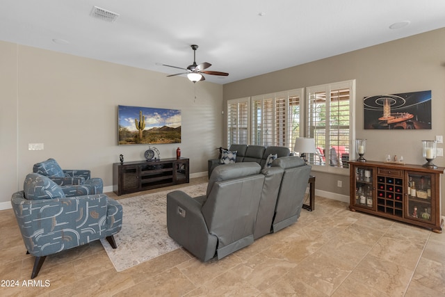 living room featuring ceiling fan