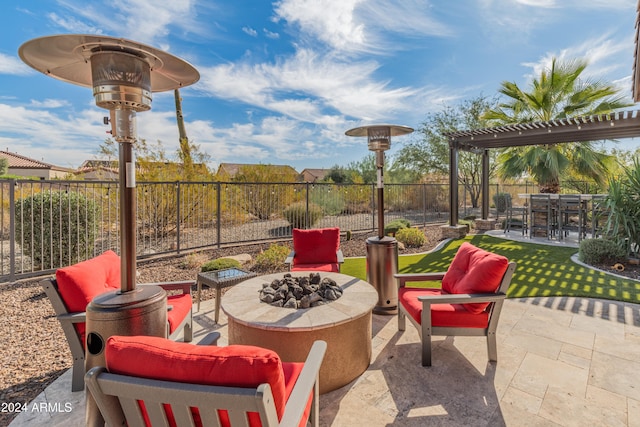 view of patio featuring a fire pit