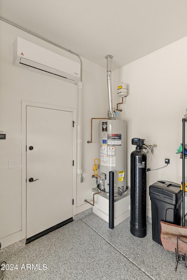 utilities featuring a wall unit AC and gas water heater