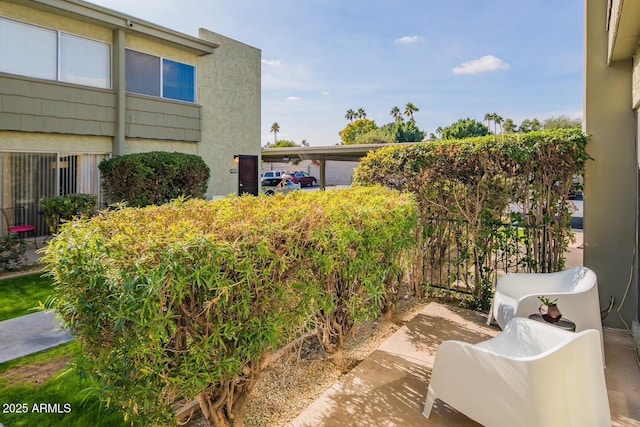 view of patio / terrace with fence