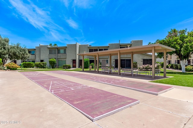 4610 N 68th St Unit 402, Scottsdale, AZ 85251 - surrounding community with shuffleboard and a yard