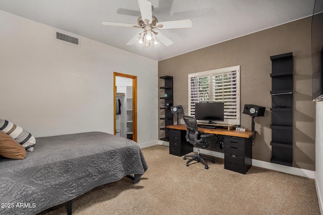 bedroom featuring light colored carpet and ceiling fan