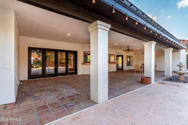 view of patio with ceiling fan