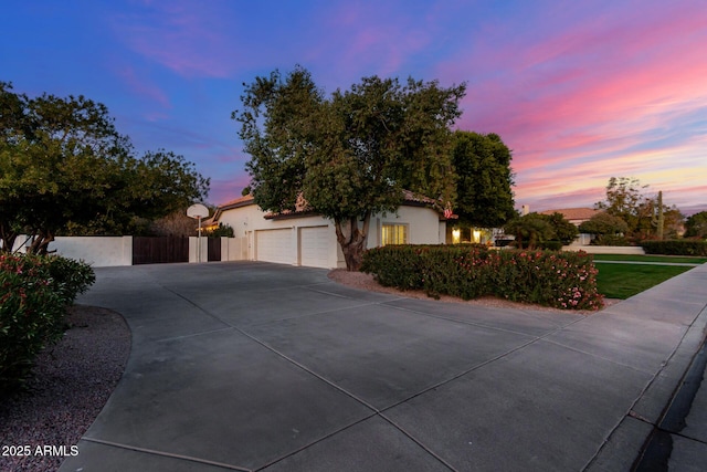 view of front of home with a garage