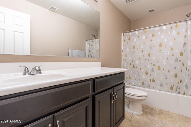 full bathroom featuring vanity, toilet, and shower / tub combo