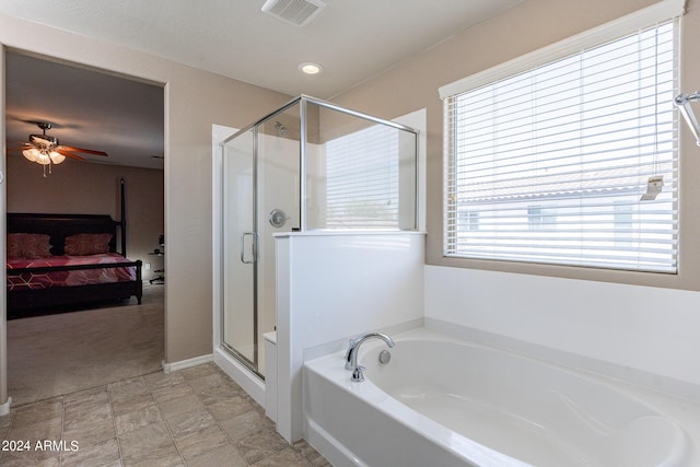 full bathroom featuring visible vents, a stall shower, a ceiling fan, ensuite bath, and a bath