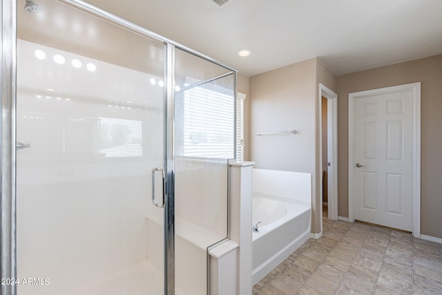 bathroom with plus walk in shower