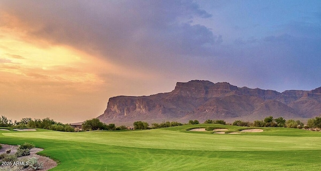 7751 E Golden Eagle Cir, Gold Canyon, AZ 85118 - view of community featuring view of golf course, a mountain view, and a lawn