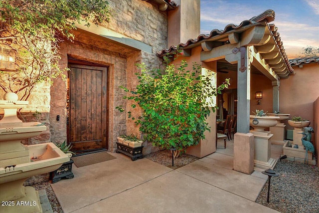 7751 E Golden Eagle Cir, Gold Canyon, AZ 85118 - doorway to property featuring stone siding