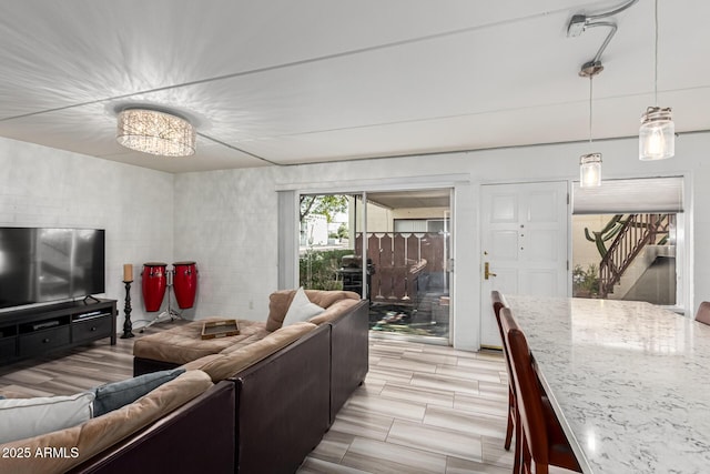 living room featuring a chandelier