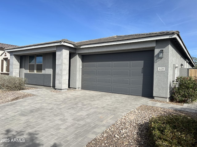 view of side of home featuring a garage