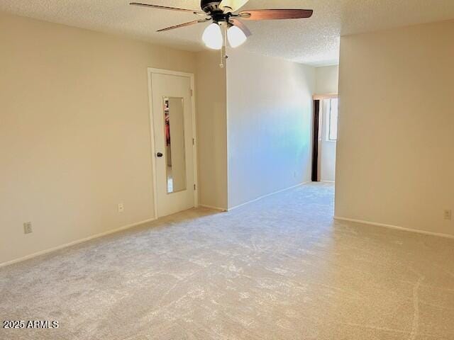 3242 W Christy Dr, Phoenix, AZ 85029 - unfurnished room with a textured ceiling, baseboards, and ceiling fan