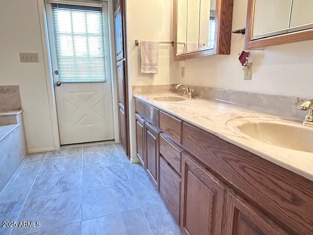 3242 W Christy Dr, Phoenix, AZ 85029 - full bath featuring double vanity, tile patterned flooring, a sink, and baseboards