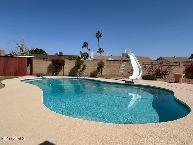 3242 W Christy Dr, Phoenix, AZ 85029 - view of swimming pool featuring a fenced backyard, a fenced in pool, and a water slide