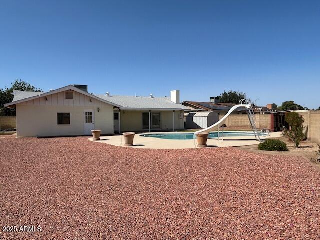 3242 W Christy Dr, Phoenix, AZ 85029 - back of property with a patio, a fenced in pool, and a fenced backyard
