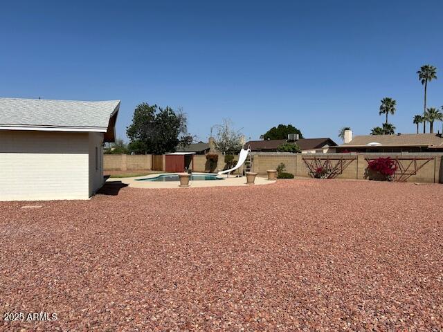 3242 W Christy Dr, Phoenix, AZ 85029 - view of yard with a fenced in pool and a fenced backyard
