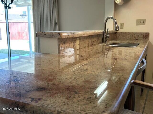 3242 W Christy Dr, Phoenix, AZ 85029 - kitchen with a sink and stone counters