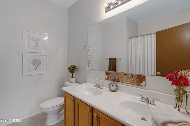 bathroom featuring toilet, vanity, walk in shower, and tile patterned flooring