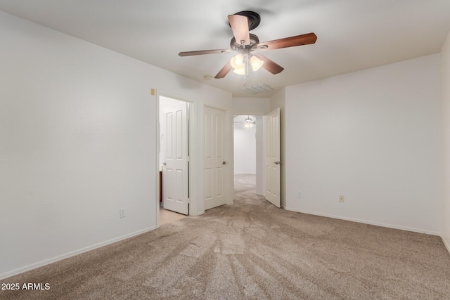 12132 W Caribbean Ln, El Mirage, AZ 85335 - spare room with light carpet and a ceiling fan
