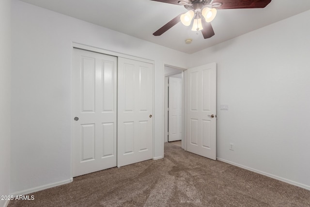 12132 W Caribbean Ln, El Mirage, AZ 85335 - unfurnished bedroom with carpet, a closet, and a ceiling fan