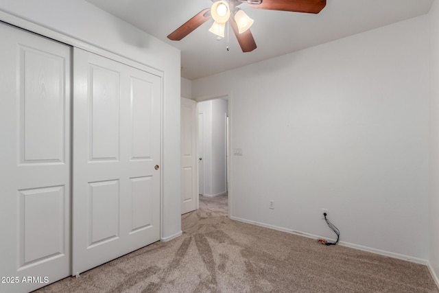12132 W Caribbean Ln, El Mirage, AZ 85335 - unfurnished bedroom featuring light colored carpet, a closet, and ceiling fan
