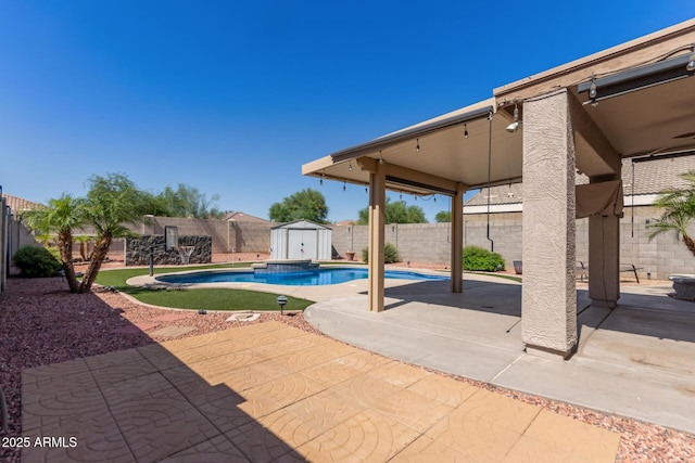 12132 W Caribbean Ln, El Mirage, AZ 85335 - view of pool featuring a shed, a patio, and a fenced backyard