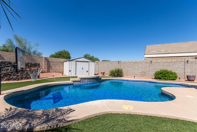 12132 W Caribbean Ln, El Mirage, AZ 85335 - view of swimming pool featuring a storage unit and a fenced backyard