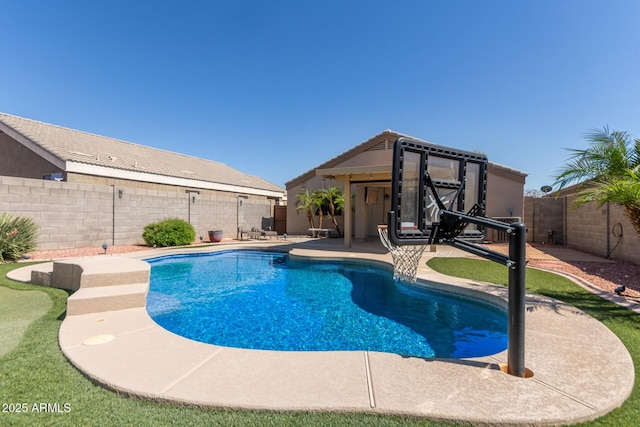 12132 W Caribbean Ln, El Mirage, AZ 85335 - view of swimming pool with a patio area and a fenced backyard