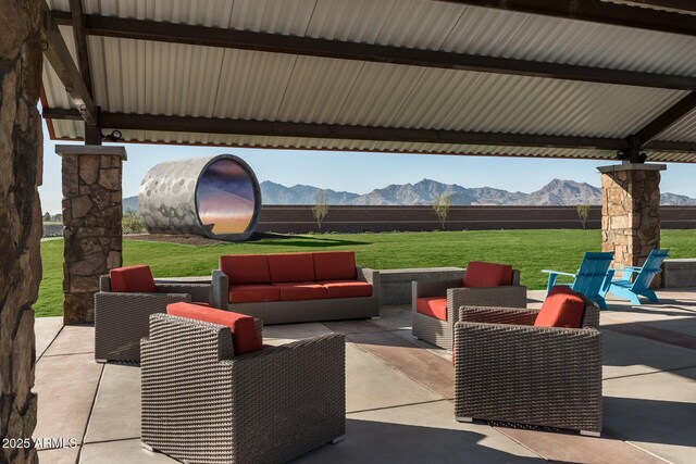 12712 W Corona Ave, Avondale, AZ 85323 - view of patio featuring outdoor lounge area and a mountain view