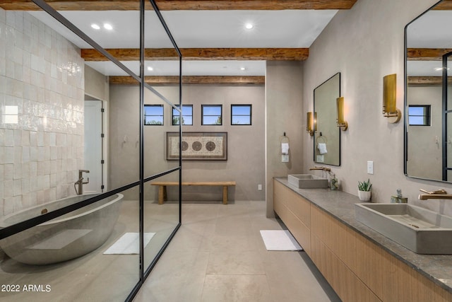 bathroom with tile patterned flooring, beam ceiling, and vanity