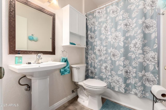 bathroom with wood-type flooring, toilet, and a shower with shower curtain