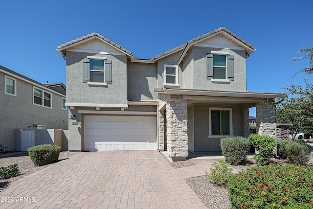 view of front of home with a garage