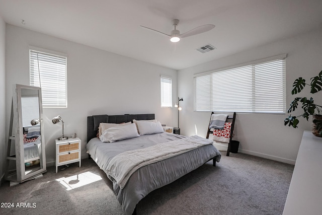 carpeted bedroom featuring ceiling fan