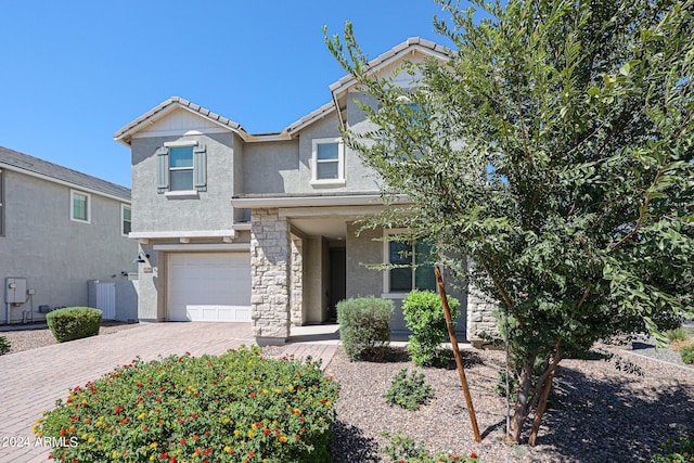 view of front of home featuring a garage