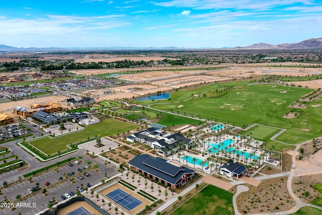 drone / aerial view featuring a water and mountain view