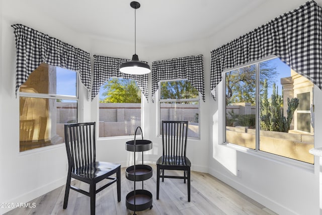 sunroom featuring a wealth of natural light