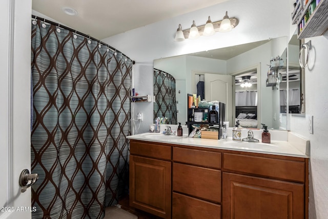 33602 N Cobble Stone Dr, San Tan Valley, AZ 85143 - ensuite bathroom with double vanity, a ceiling fan, and a shower with shower curtain