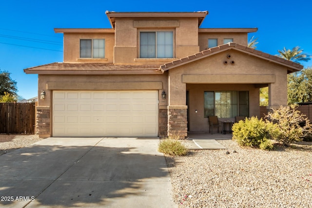 33602 N Cobble Stone Dr, San Tan Valley, AZ 85143 - view of front of property featuring an attached garage, driveway, stucco siding, fence, and stone siding