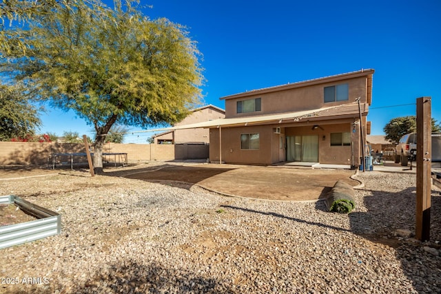 33602 N Cobble Stone Dr, San Tan Valley, AZ 85143 - rear view of house with stucco siding, a patio area, and fence