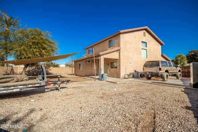 33602 N Cobble Stone Dr, San Tan Valley, AZ 85143 - rear view of house featuring fence, stucco siding, and a patio area