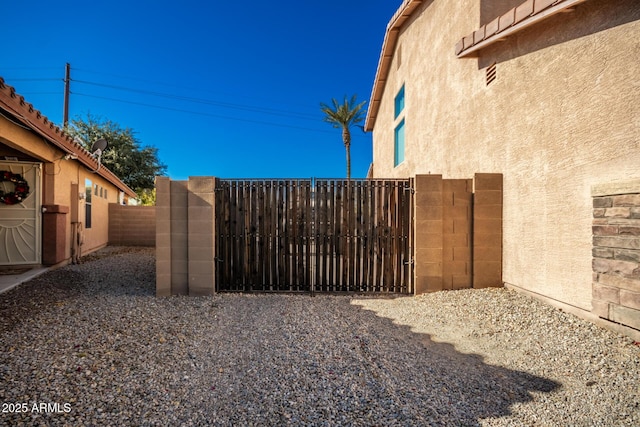 33602 N Cobble Stone Dr, San Tan Valley, AZ 85143 - view of yard with a gate and fence