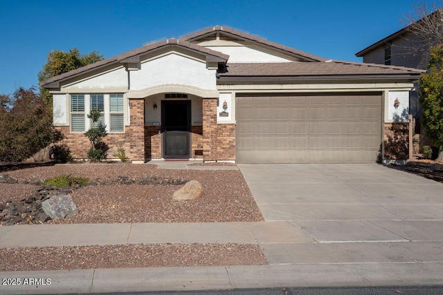 view of front of property with a garage